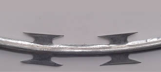 A bent round bar with blade type BTO-30.